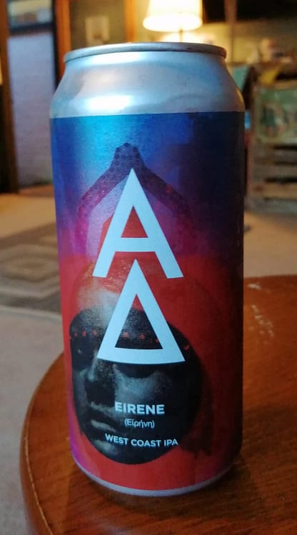 Large can fading from blue to pink, a person's face at the bottom; emblazoned with an A (alpha) over a triangle (Delta).
