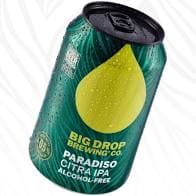 Green can with a black top is shown tilted. Can features large yellow teardrop shape