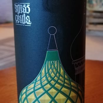 Tall black can with illustration of domes